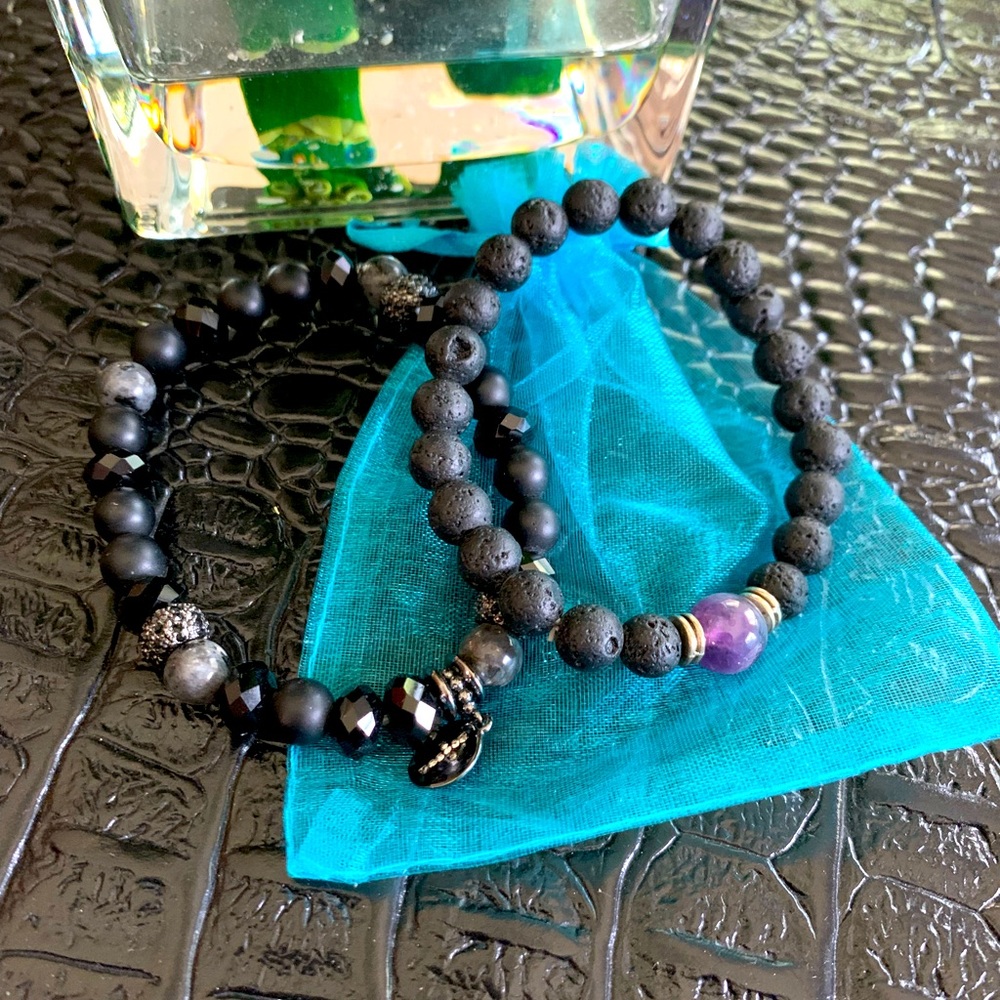 Two black onyx/lava beaded bracelets